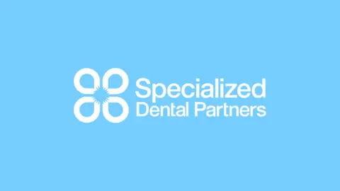 Specialized Dental Partners logo on a light blue background.