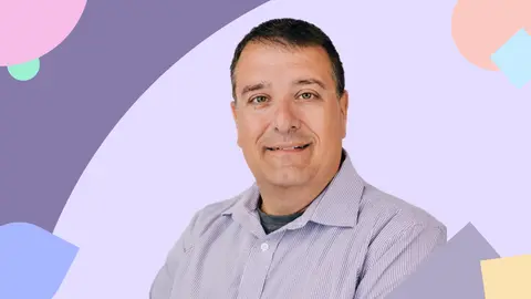 Portrait of Joe Ursitti, Senior Director of Delivery Services at Planful. Joe smiles in front of a purple background.
